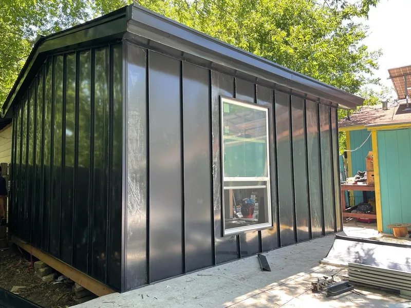 Black standing seam metal wall panels for Metal Roof Installation in New Brighton