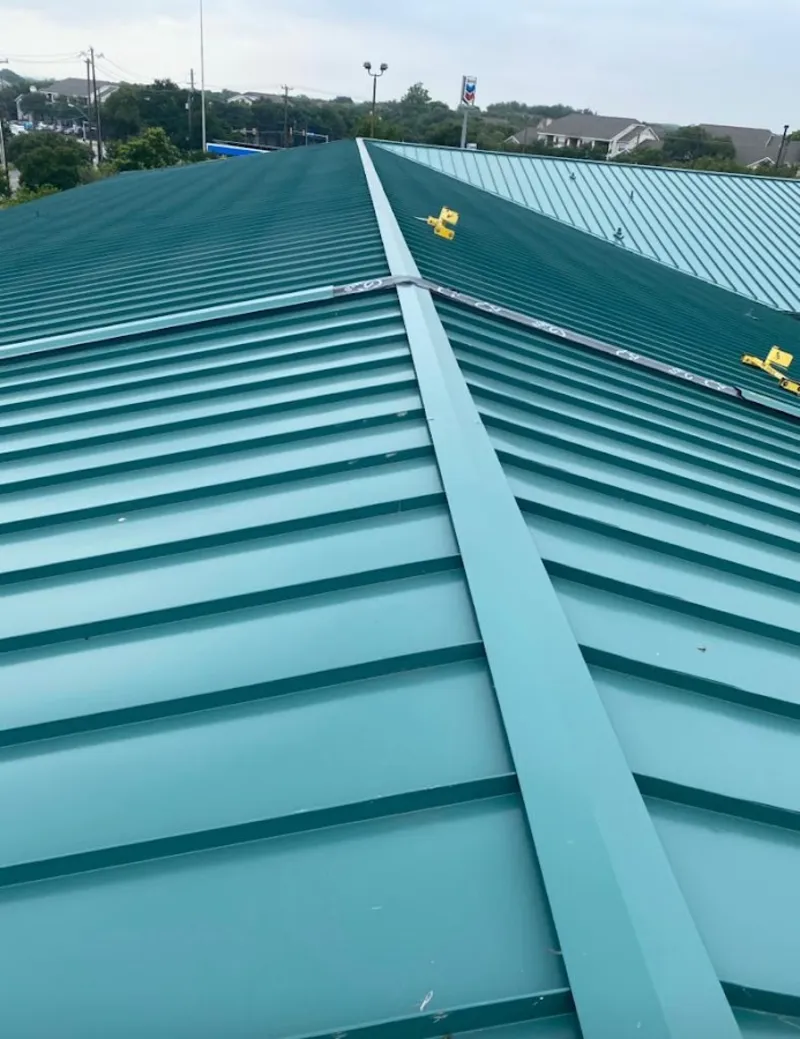Green commercial metal roof ridge and valley for Metal Roof Repair in New Brighton